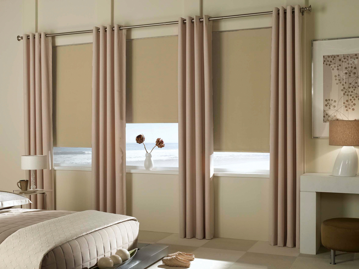 bedroom drapery and roller blinds